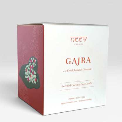 NEEV Gajra candle packaging on a light gray background